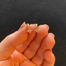 Load image into Gallery viewer, Gold flower huggie hoops
