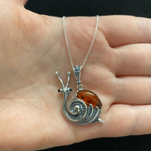 Load image into Gallery viewer, Amber snail necklace
