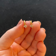 Load image into Gallery viewer, Gold flower huggie hoops
