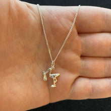 Load image into Gallery viewer, Stork and baby necklace
