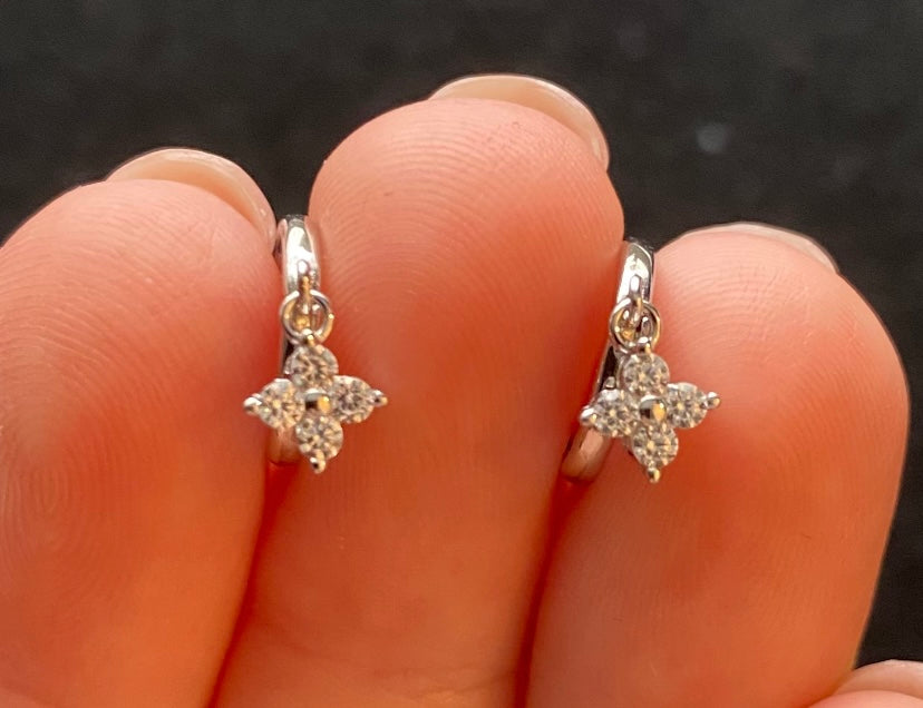 Sterling silver flower huggie hoops