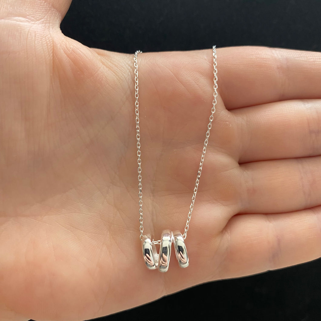 Triple ring necklace