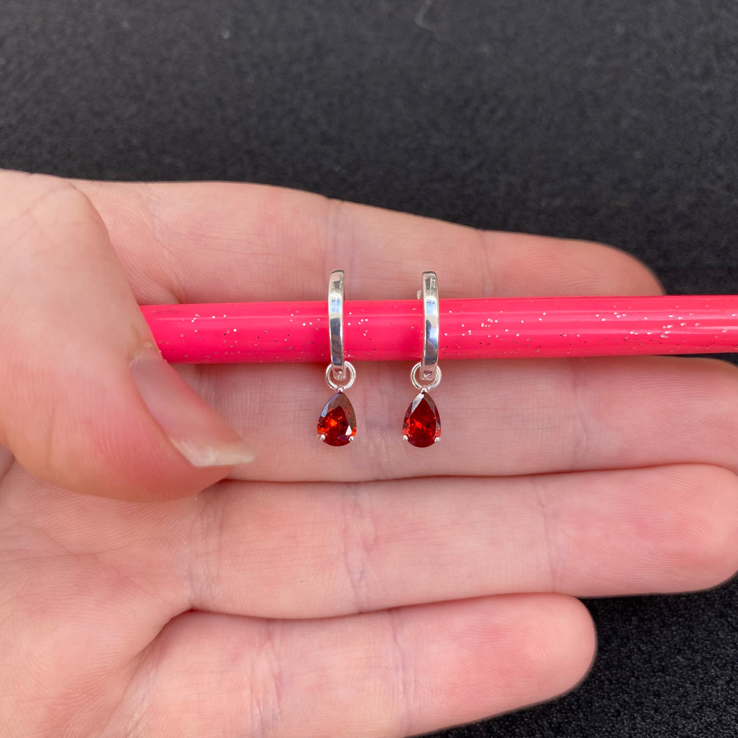 Garnet teardrop huggies