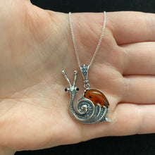 Load image into Gallery viewer, Amber snail necklace
