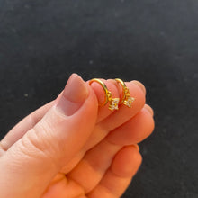 Load image into Gallery viewer, Gold flower huggie hoops
