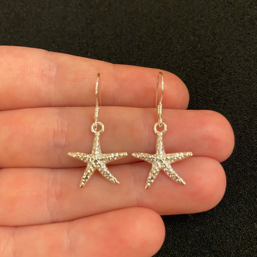 Starfish dangle earrings