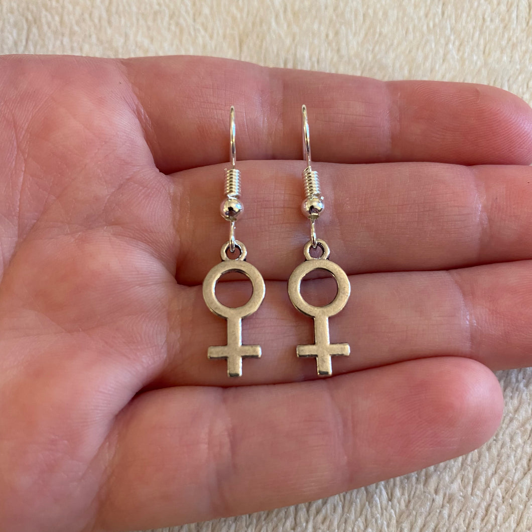Female symbol earrings