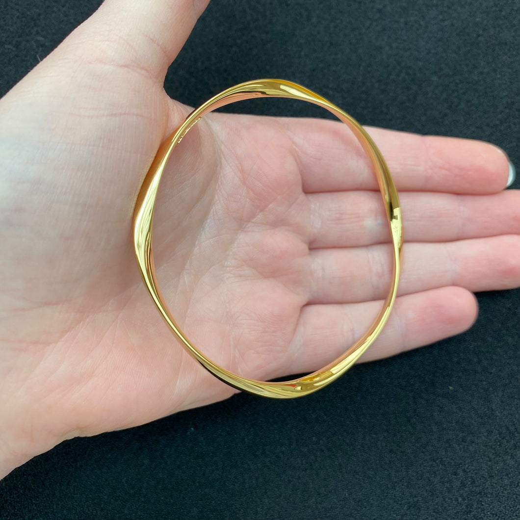 Gold twist bangle