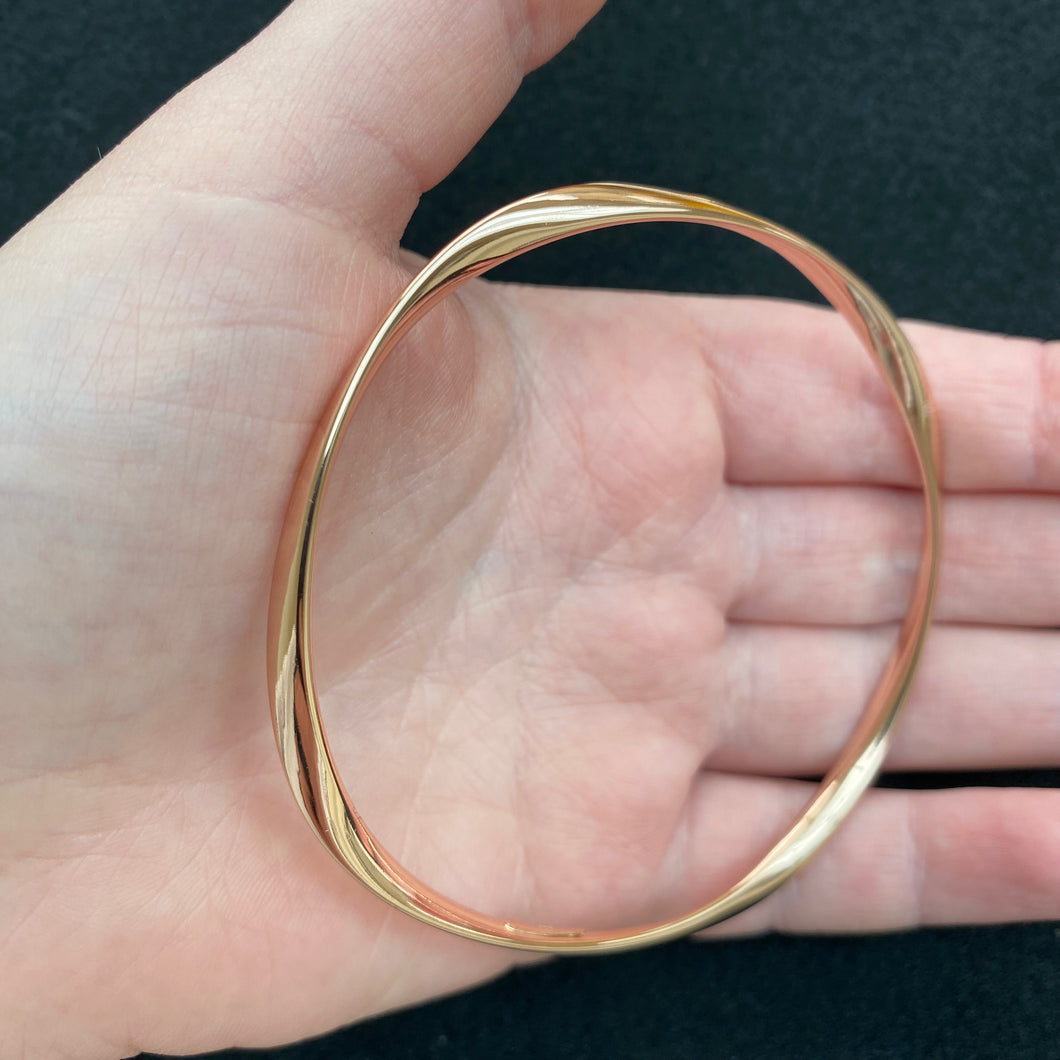 Rose gold twist bangle